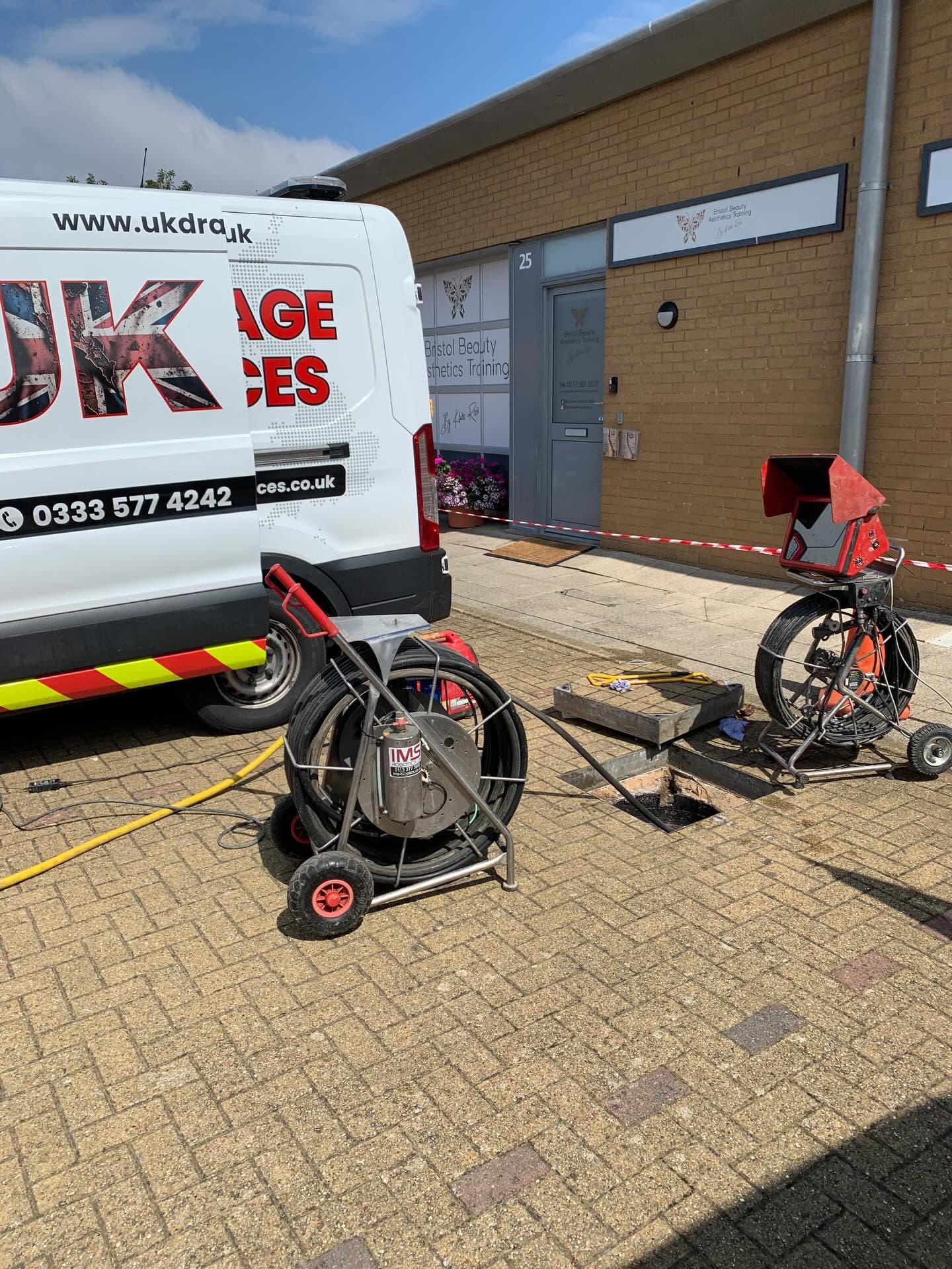 CCTV camera positioned down manhole for inspection
