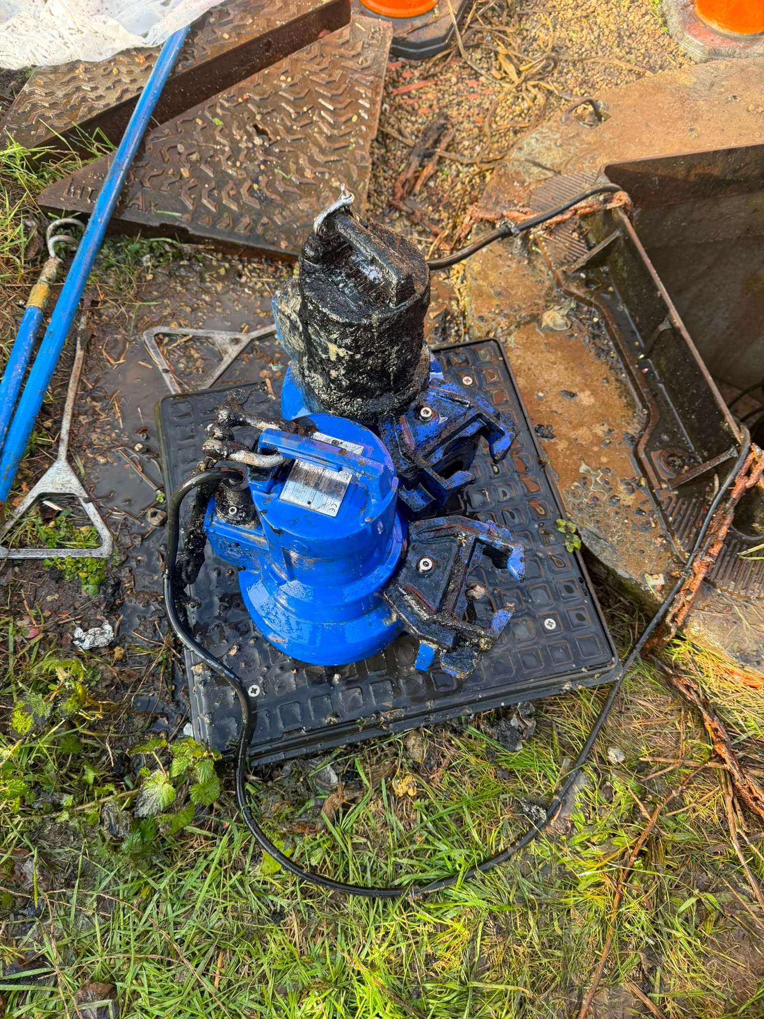 Submersible pump lifted out and de-ragged by UK Drainage Services engineers