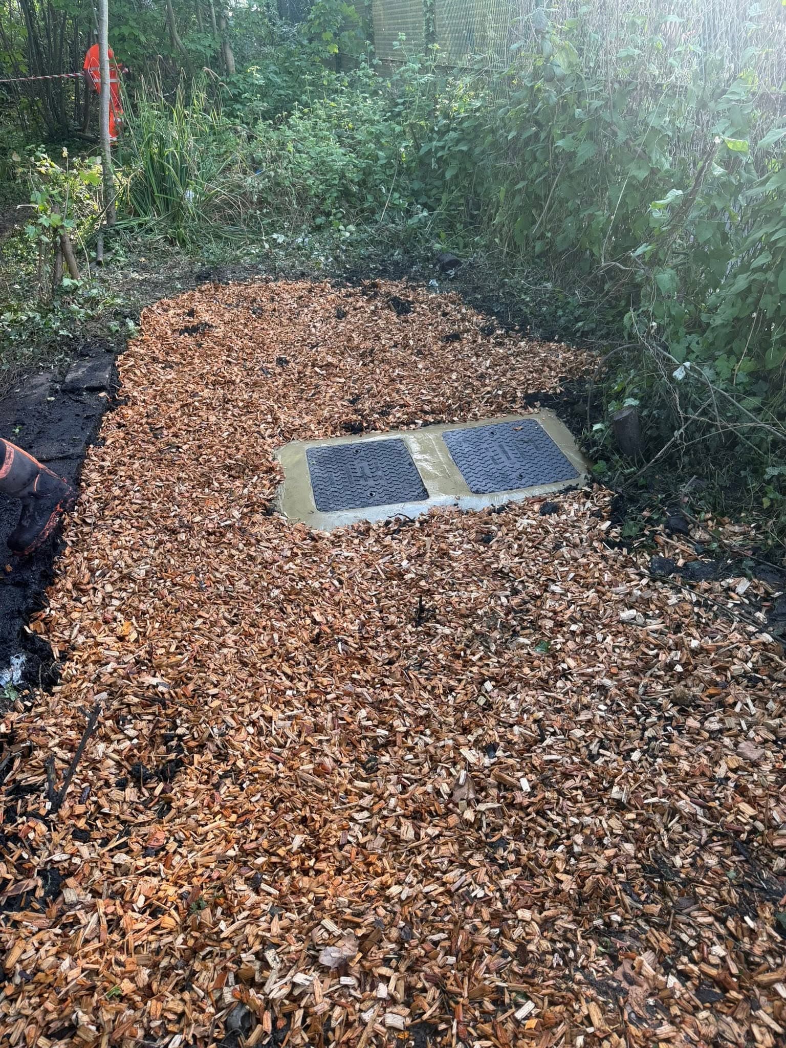 New manhole covers and frames installed by the UK Drainage Services civils team, area left safe and reinstated
