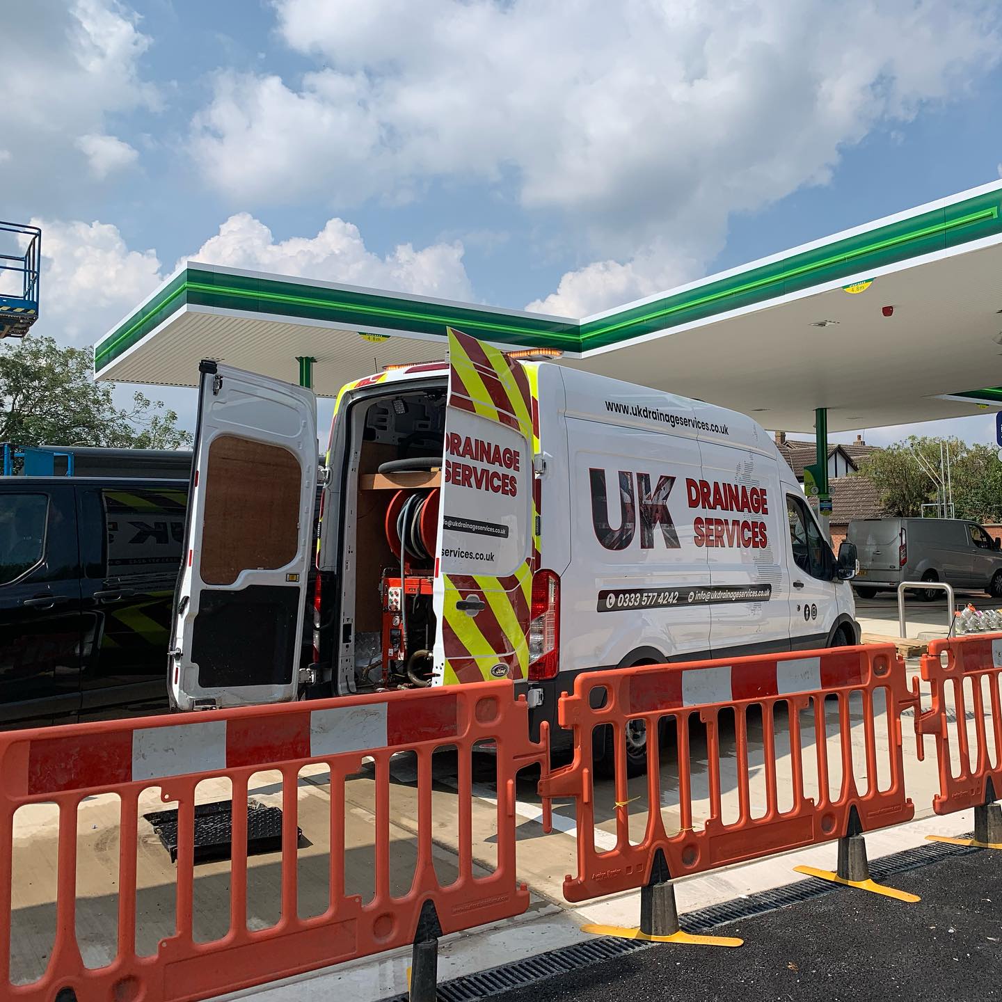 UK Drainage Services carrying out drainage works at a petrol filling station forecourt